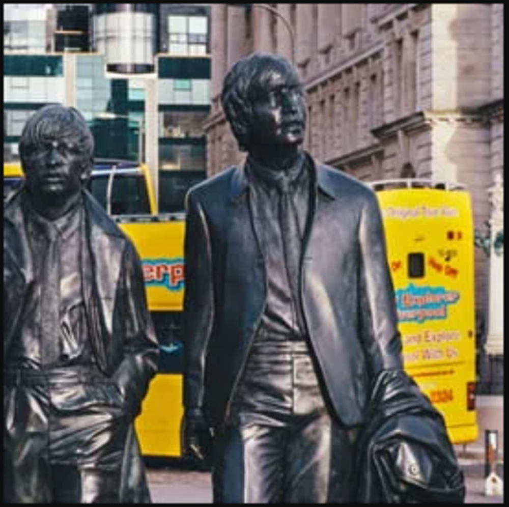 Beatles City Explorer bus with statues
